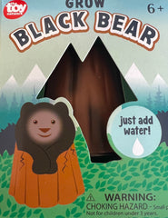 HATCHING GROWING BLACK BEAR IN TREE STUMP (sold by piece or dozen)