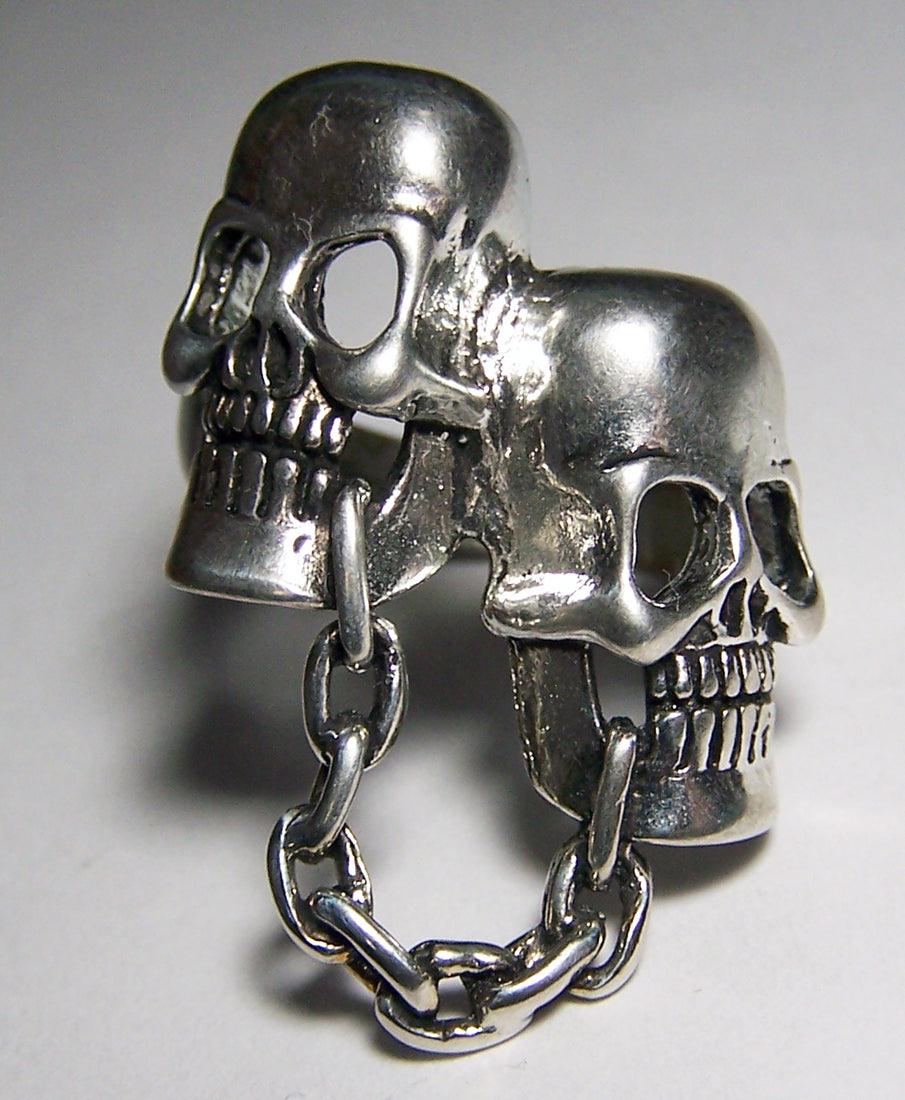 CHAINED TOGETHER SKULL HEADS BIKER RING (Sold by the piece)