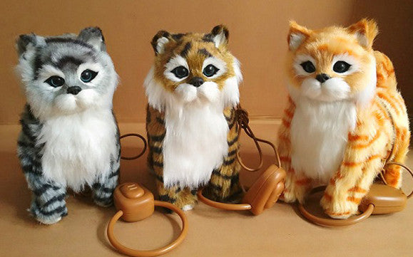battery oper REMOTE CONTOL WALKING & MEOWING KITTEN CAT ( sold by the piece )